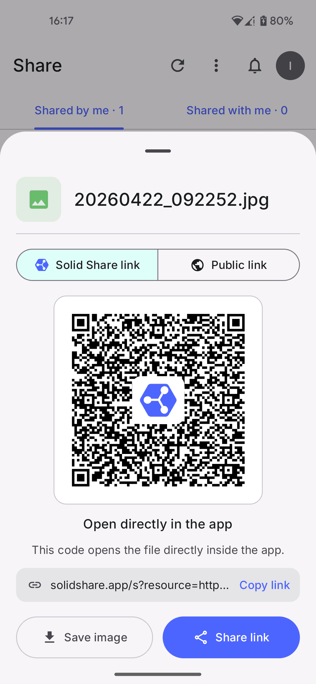 A share presented as a link with its QR code